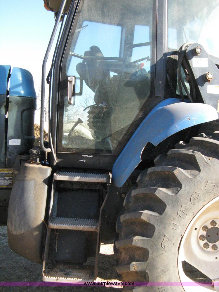 image for item 8105 1999 New Holland TV140 bi-directional tractor