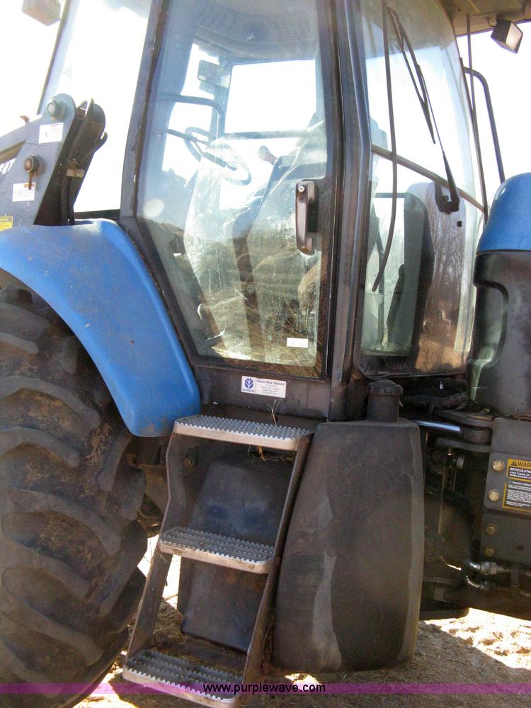 image for item 8105 1999 New Holland TV140 bi-directional tractor