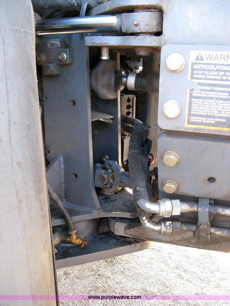 image for item 8105 1999 New Holland TV140 bi-directional tractor