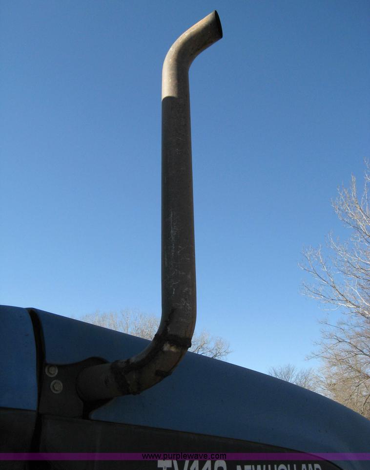 image for item 8105 1999 New Holland TV140 bi-directional tractor