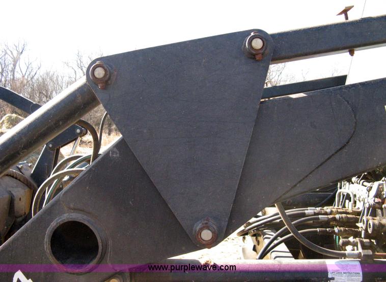 image for item 8105 1999 New Holland TV140 bi-directional tractor