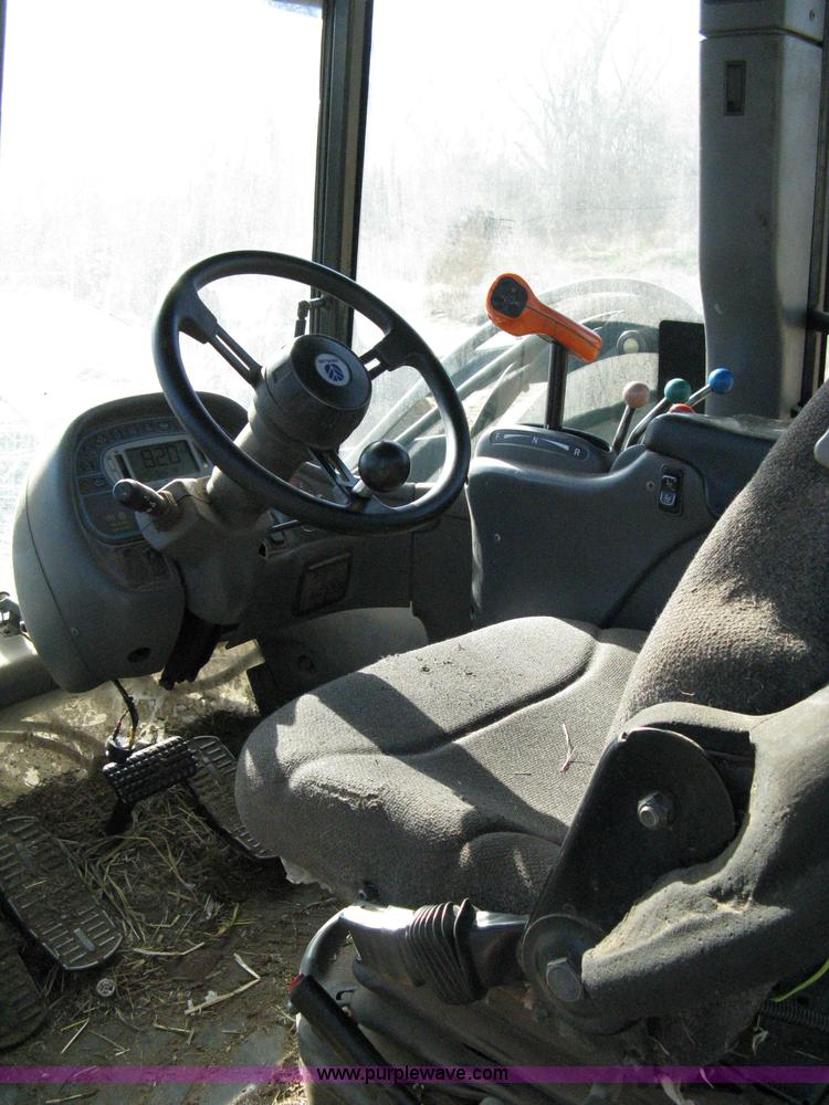 image for item 8105 1999 New Holland TV140 bi-directional tractor