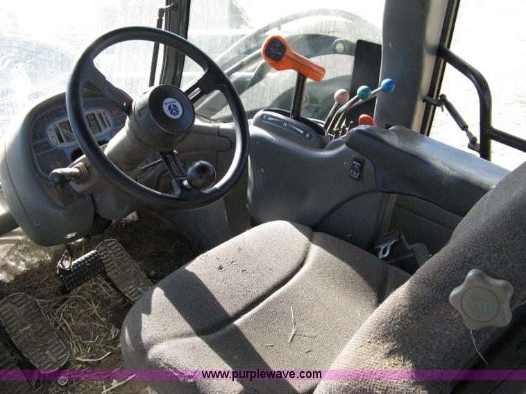 image for item 8105 1999 New Holland TV140 bi-directional tractor