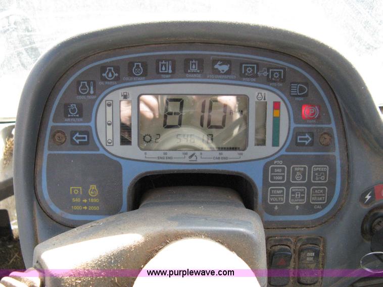 image for item 8105 1999 New Holland TV140 bi-directional tractor