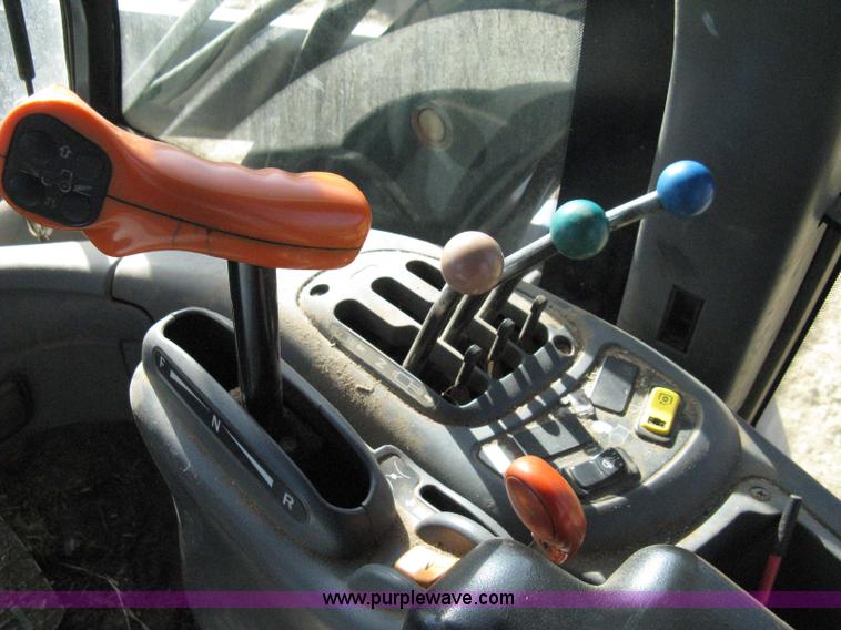 image for item 8105 1999 New Holland TV140 bi-directional tractor