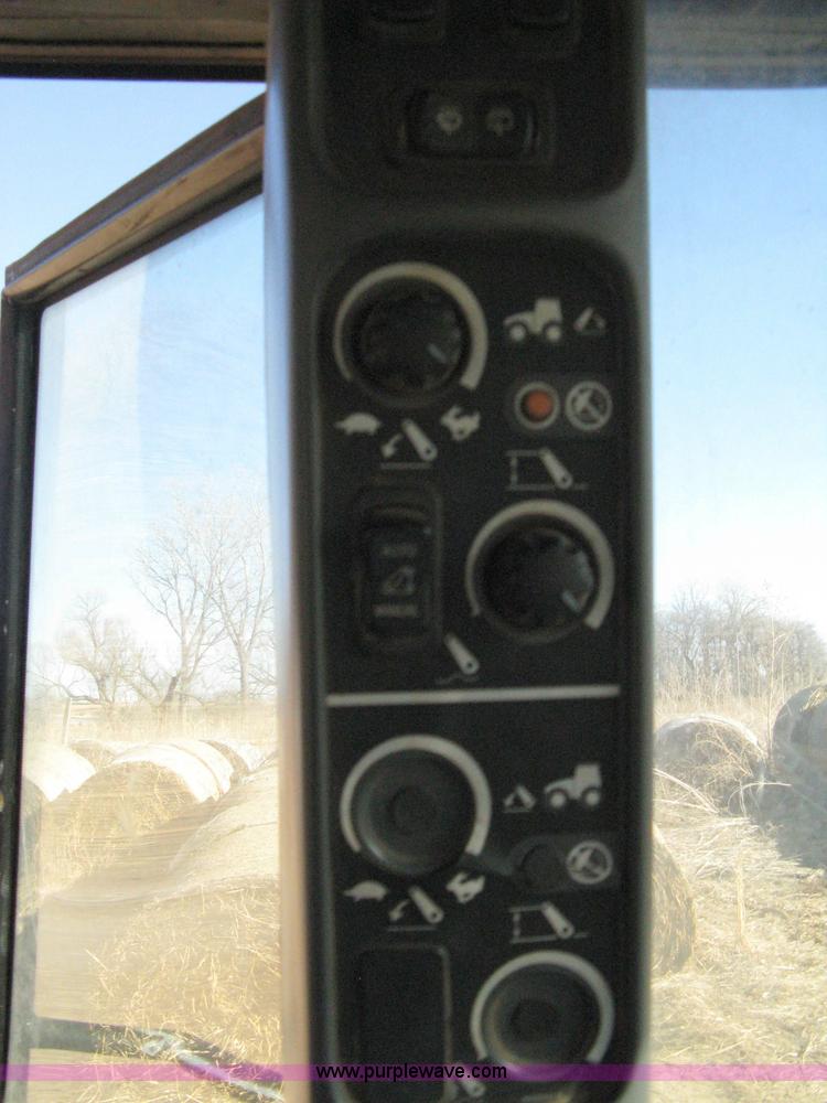 image for item 8105 1999 New Holland TV140 bi-directional tractor