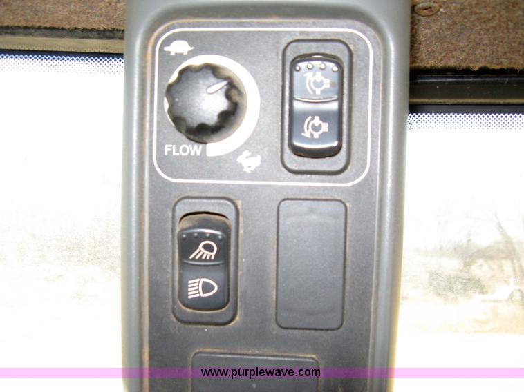 image for item 8105 1999 New Holland TV140 bi-directional tractor