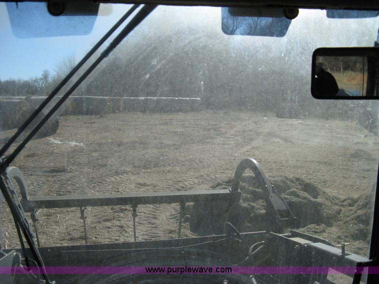 image for item 8105 1999 New Holland TV140 bi-directional tractor