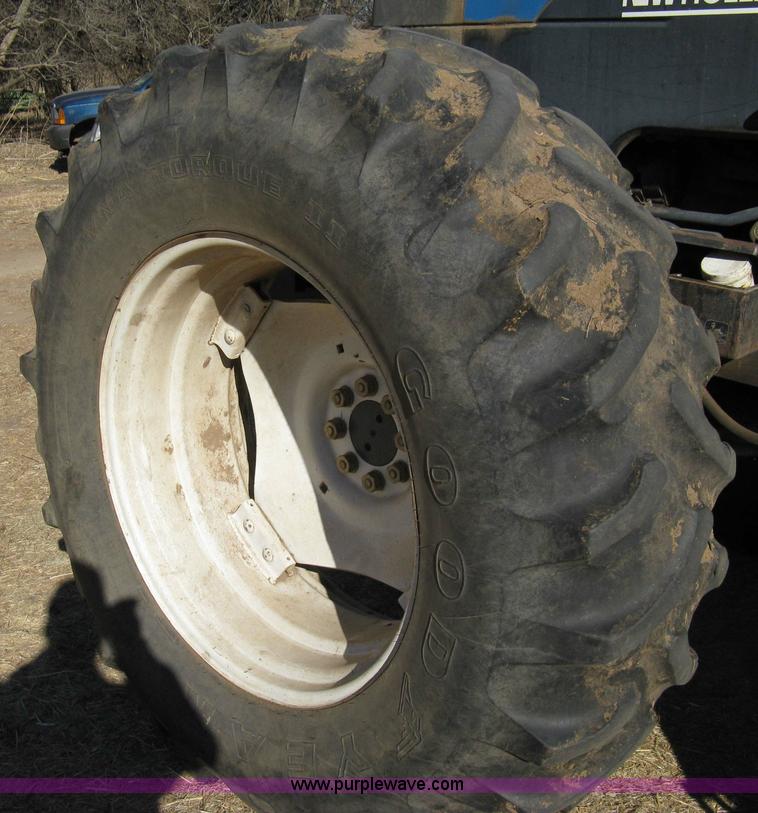 image for item 8105 1999 New Holland TV140 bi-directional tractor