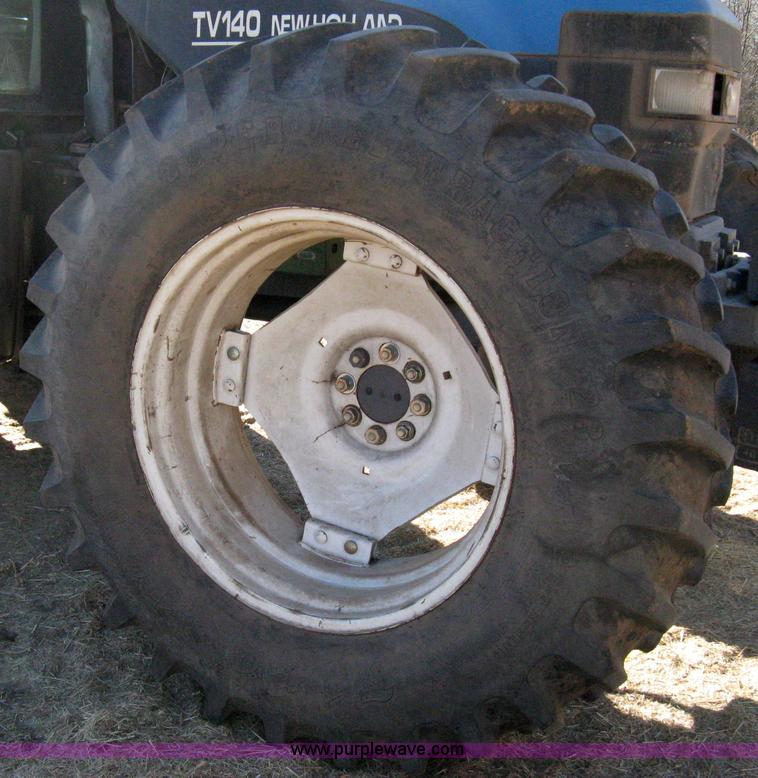 image for item 8105 1999 New Holland TV140 bi-directional tractor