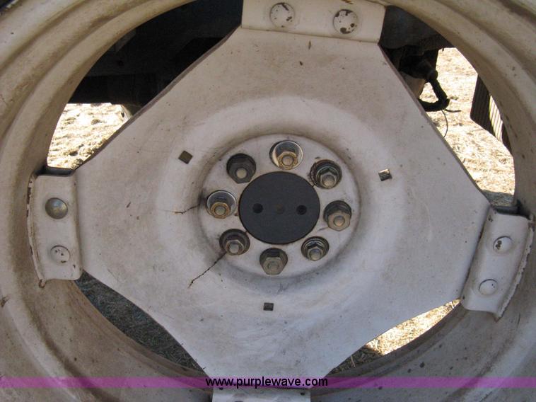 image for item 8105 1999 New Holland TV140 bi-directional tractor