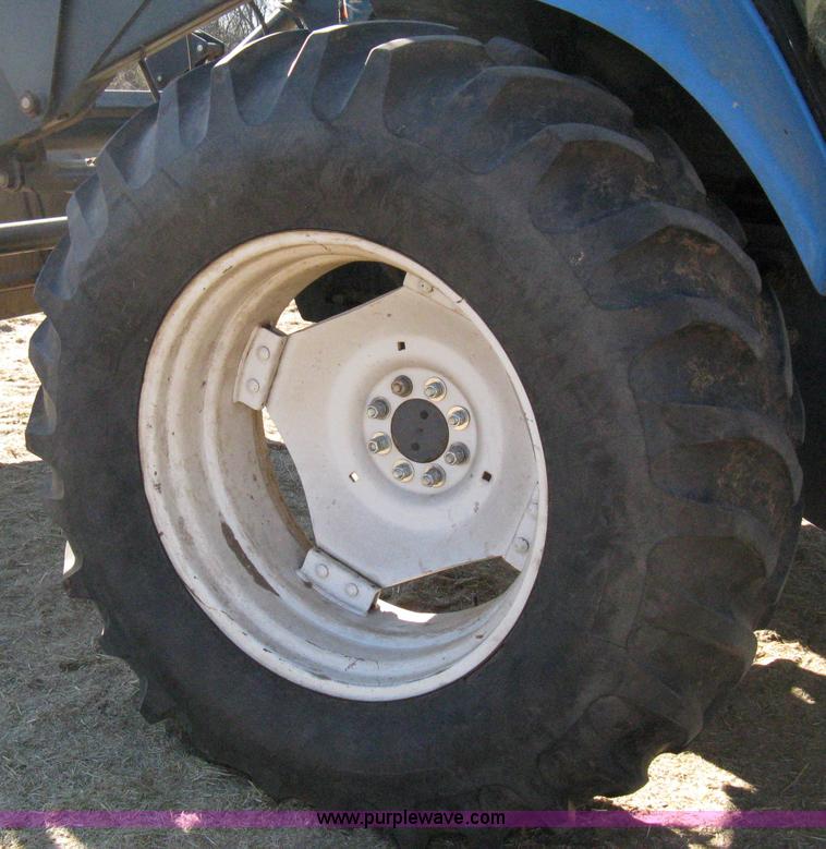 image for item 8105 1999 New Holland TV140 bi-directional tractor