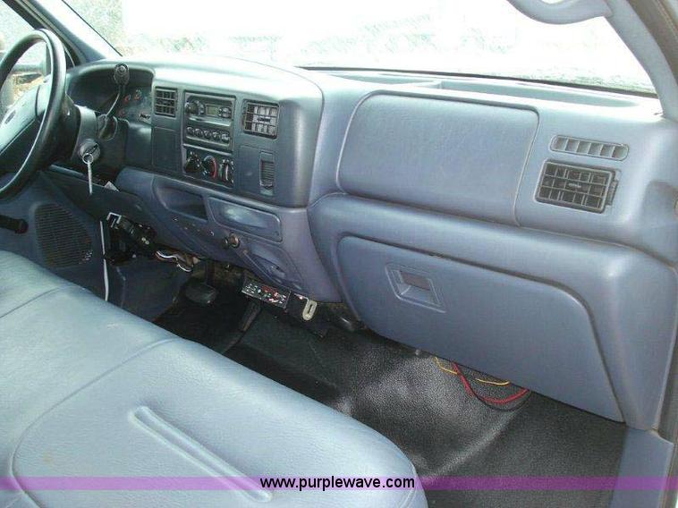 image for item 1005 2000 Ford F-350 Super Duty extended cab pickup truck with 8' service body