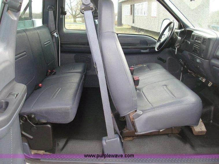 image for item 1005 2000 Ford F-350 Super Duty extended cab pickup truck with 8' service body