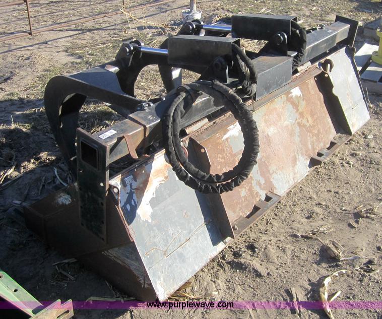 image for item 3286 Skid loader 80" bucket with grapple forks