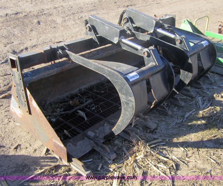 image for item 3286 Skid loader 80" bucket with grapple forks