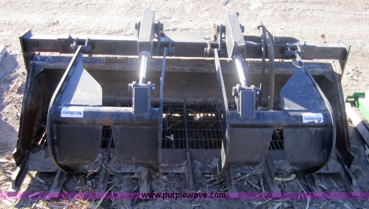image for item 3286 Skid loader 80" bucket with grapple forks