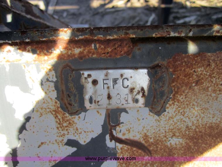 image for item 3286 Skid loader 80" bucket with grapple forks