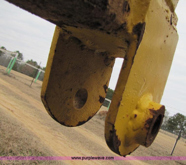 image for item 9012 Workhorse skid steer 14' hydraulic boom extender