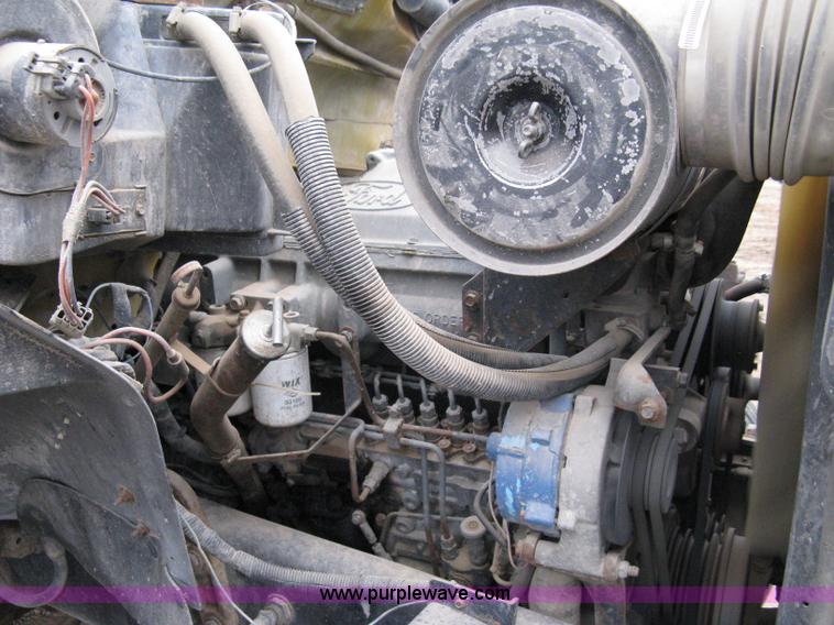 image for item 8095 1991 Ford FT900 tandem axle dump truck