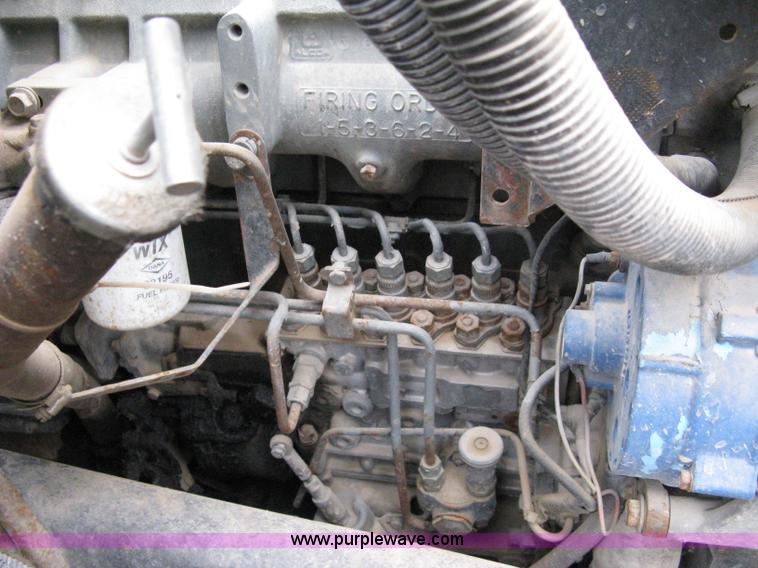 image for item 8095 1991 Ford FT900 tandem axle dump truck