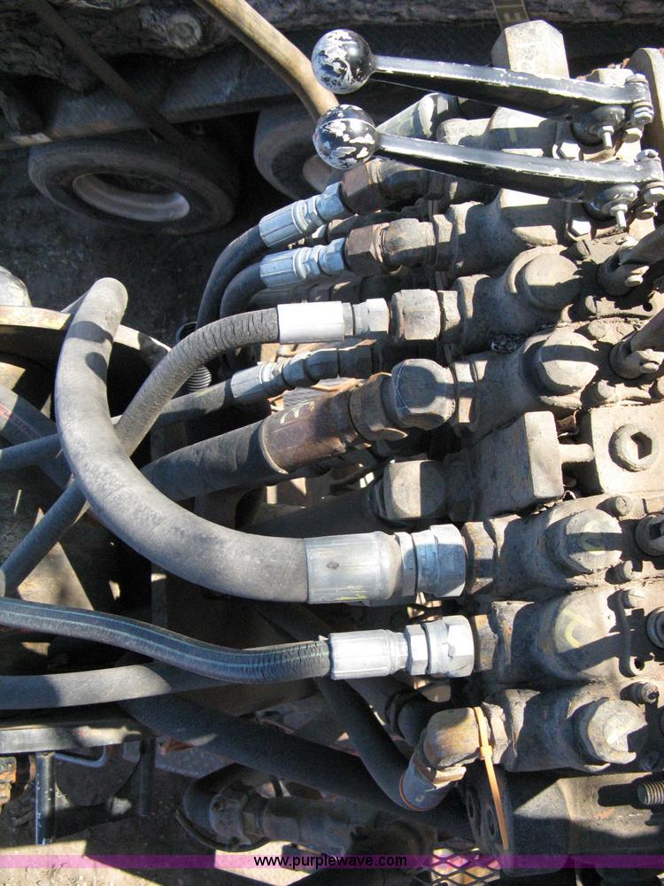 image for item 8104 Dunham L190-RR-L knuckle boom grapple lift