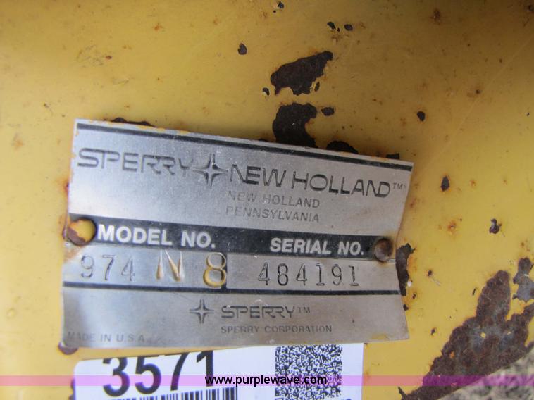 image for item 3571 New Holland 974 eight row corn head