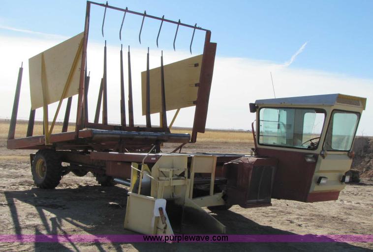 image for item 8346 New Holland 1049 stack cruiser