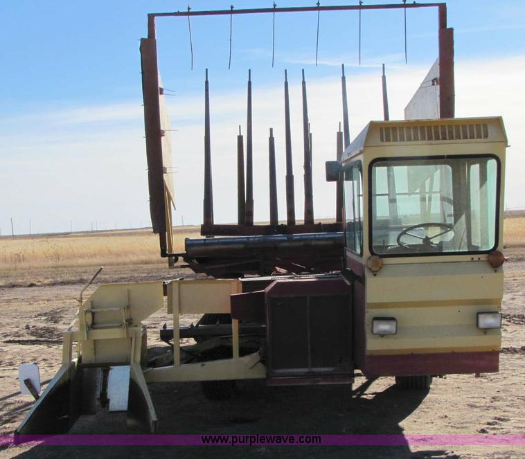 image for item 8346 New Holland 1049 stack cruiser