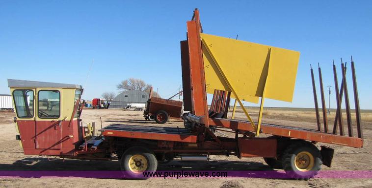 image for item 8346 New Holland 1049 stack cruiser