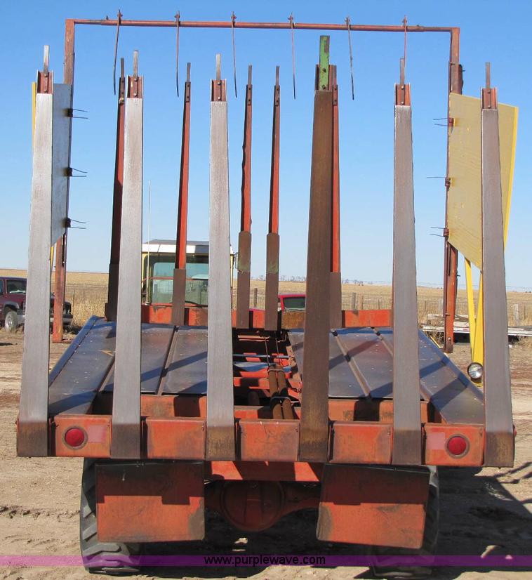 image for item 8346 New Holland 1049 stack cruiser