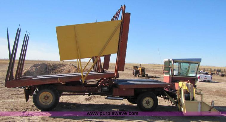 image for item 8346 New Holland 1049 stack cruiser