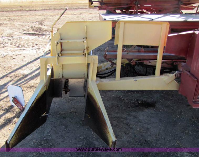 image for item 8346 New Holland 1049 stack cruiser