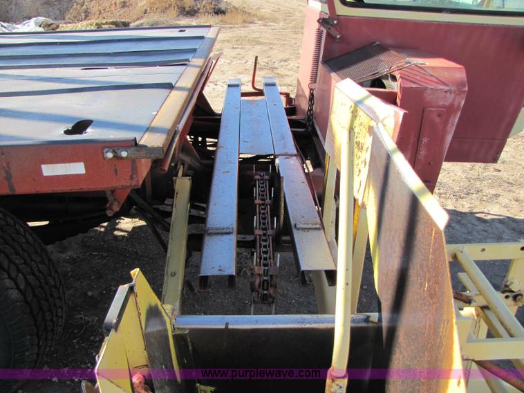 image for item 8346 New Holland 1049 stack cruiser