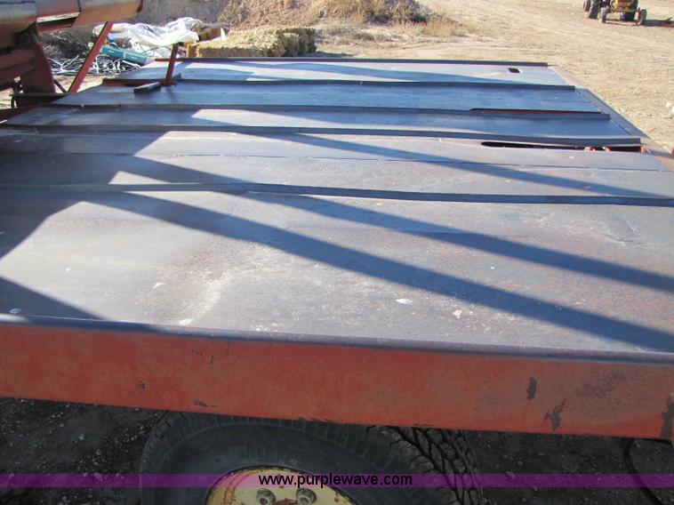 image for item 8346 New Holland 1049 stack cruiser