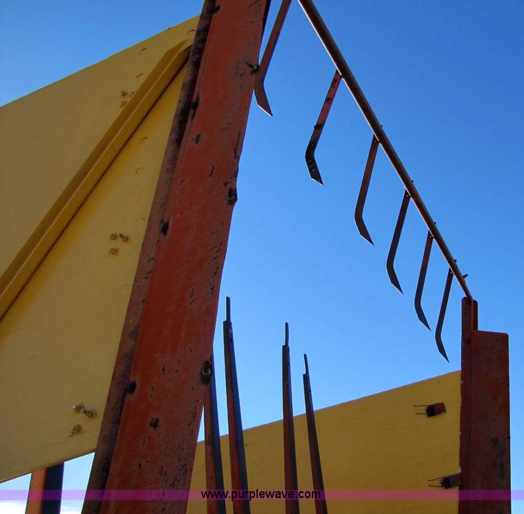 image for item 8346 New Holland 1049 stack cruiser