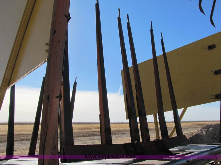 image for item 8346 New Holland 1049 stack cruiser