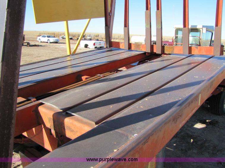 image for item 8346 New Holland 1049 stack cruiser