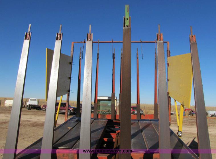 image for item 8346 New Holland 1049 stack cruiser