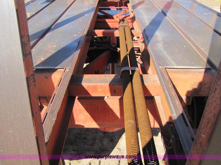 image for item 8346 New Holland 1049 stack cruiser