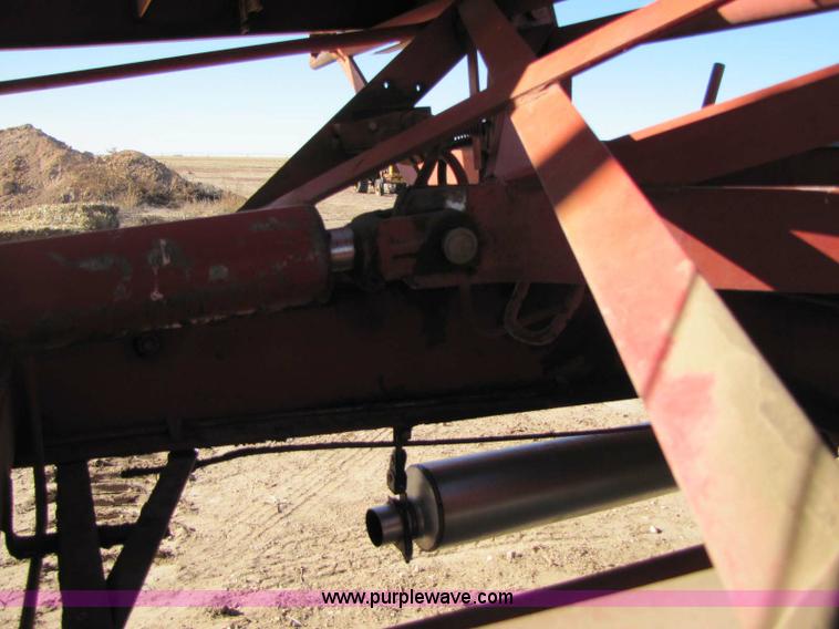 image for item 8346 New Holland 1049 stack cruiser