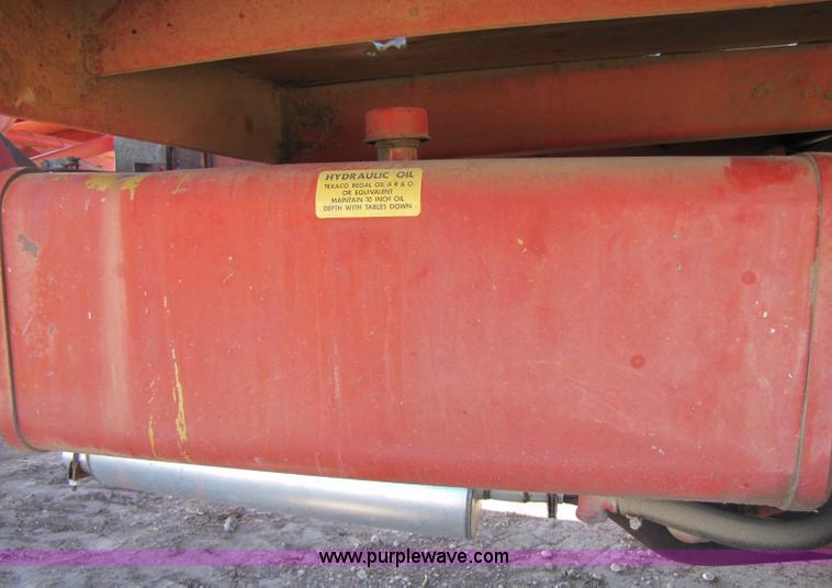 image for item 8346 New Holland 1049 stack cruiser