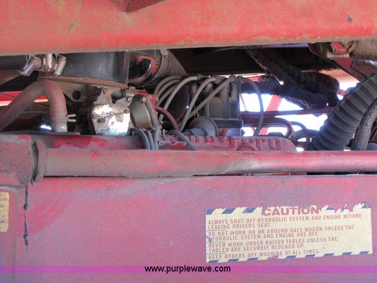 image for item 8346 New Holland 1049 stack cruiser