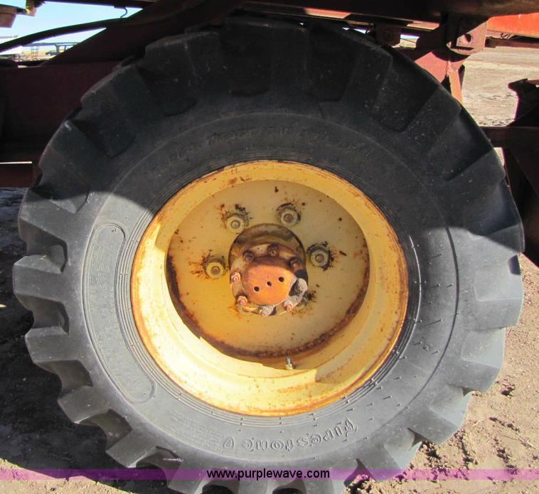 image for item 8346 New Holland 1049 stack cruiser