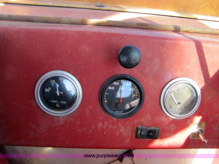 image for item 8346 New Holland 1049 stack cruiser