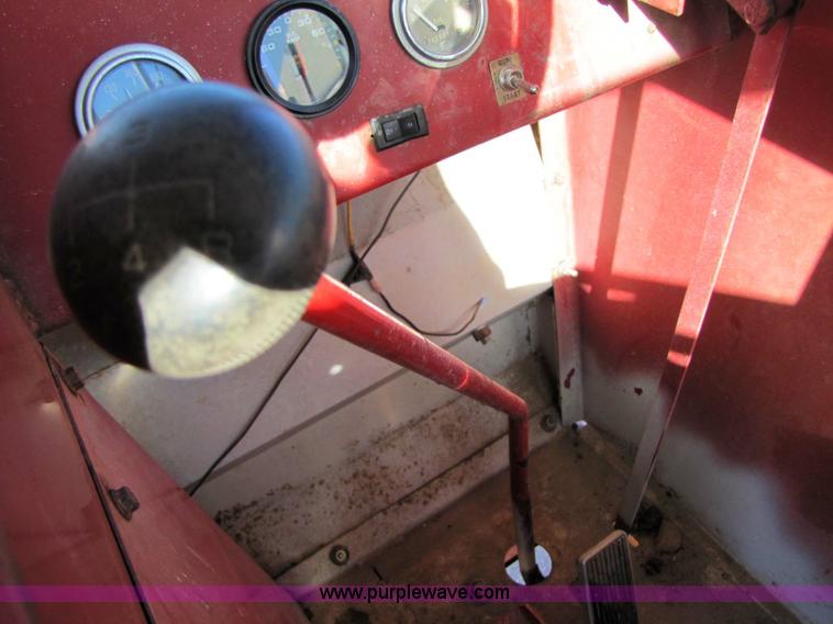 image for item 8346 New Holland 1049 stack cruiser