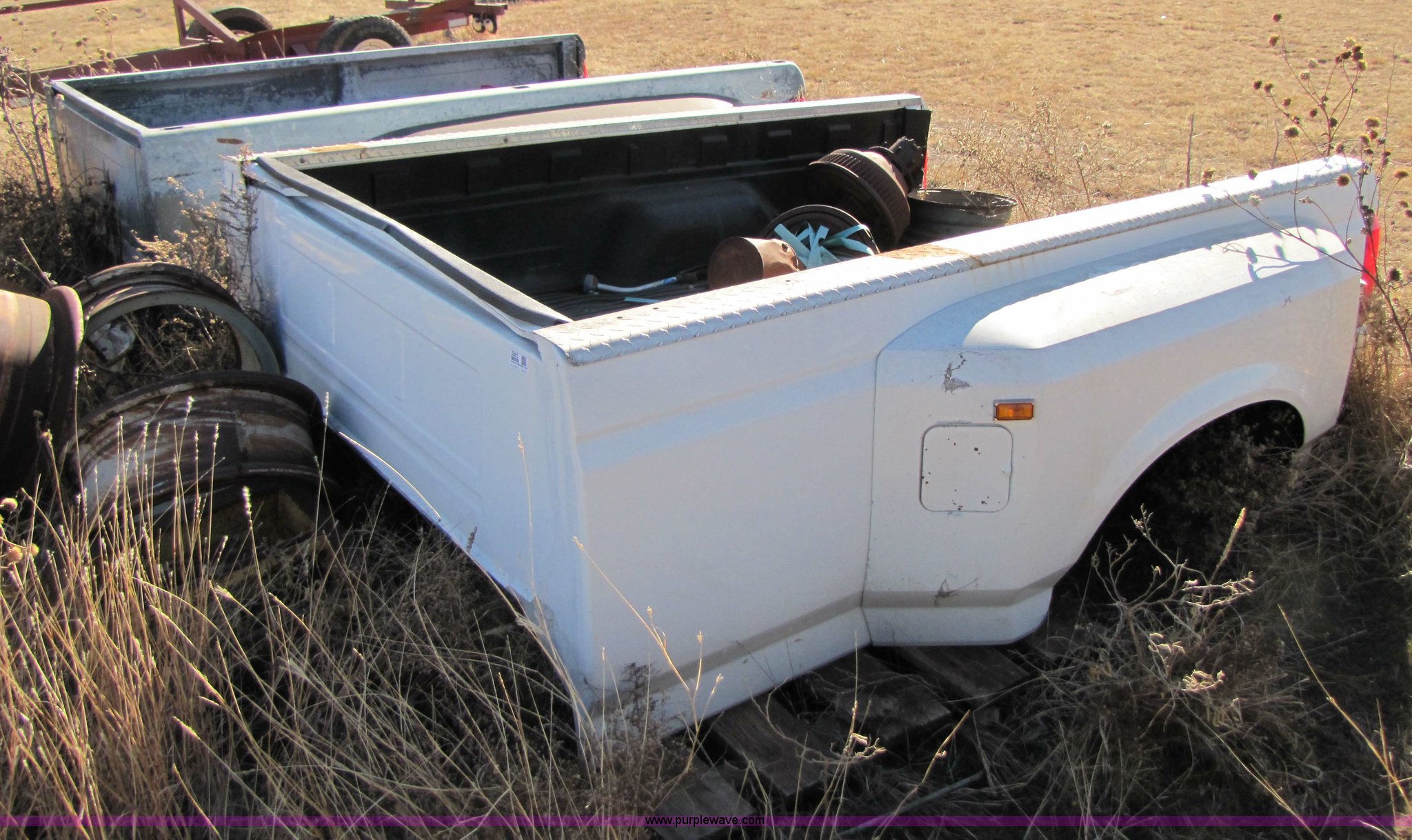 (2) Ford dually pickup beds in Altus, OK Item 3565 sold Purple Wave