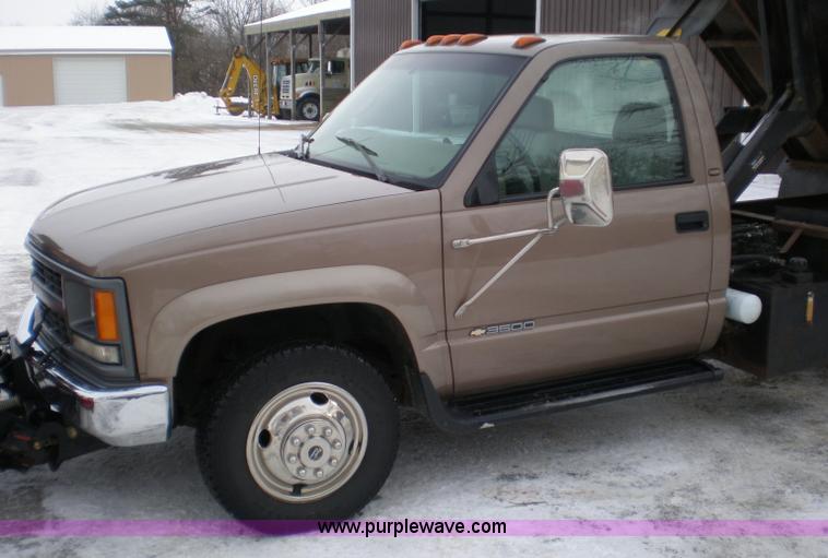 image for item 1201 1997 Chevrolet K3500 truck with dump bed and snow plow