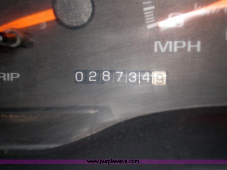 image for item 1201 1997 Chevrolet K3500 truck with dump bed and snow plow