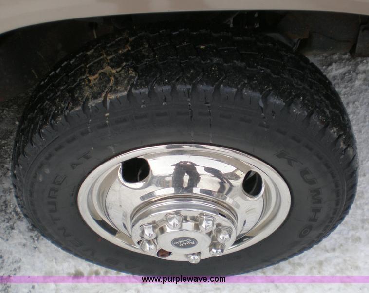 image for item 1201 1997 Chevrolet K3500 truck with dump bed and snow plow